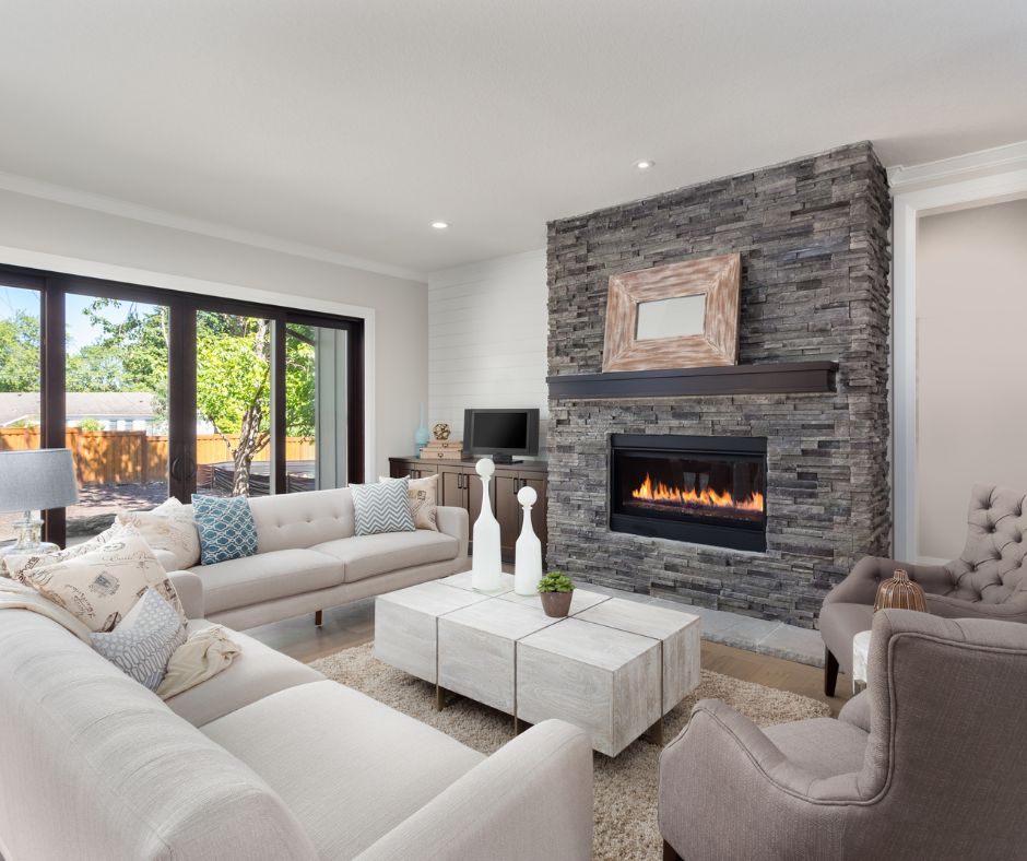 living room with furniture arranged for fireplace